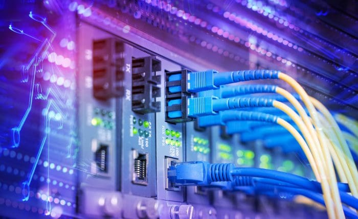 Fiber Optic cables connected to optic ports and UTP, Network cab